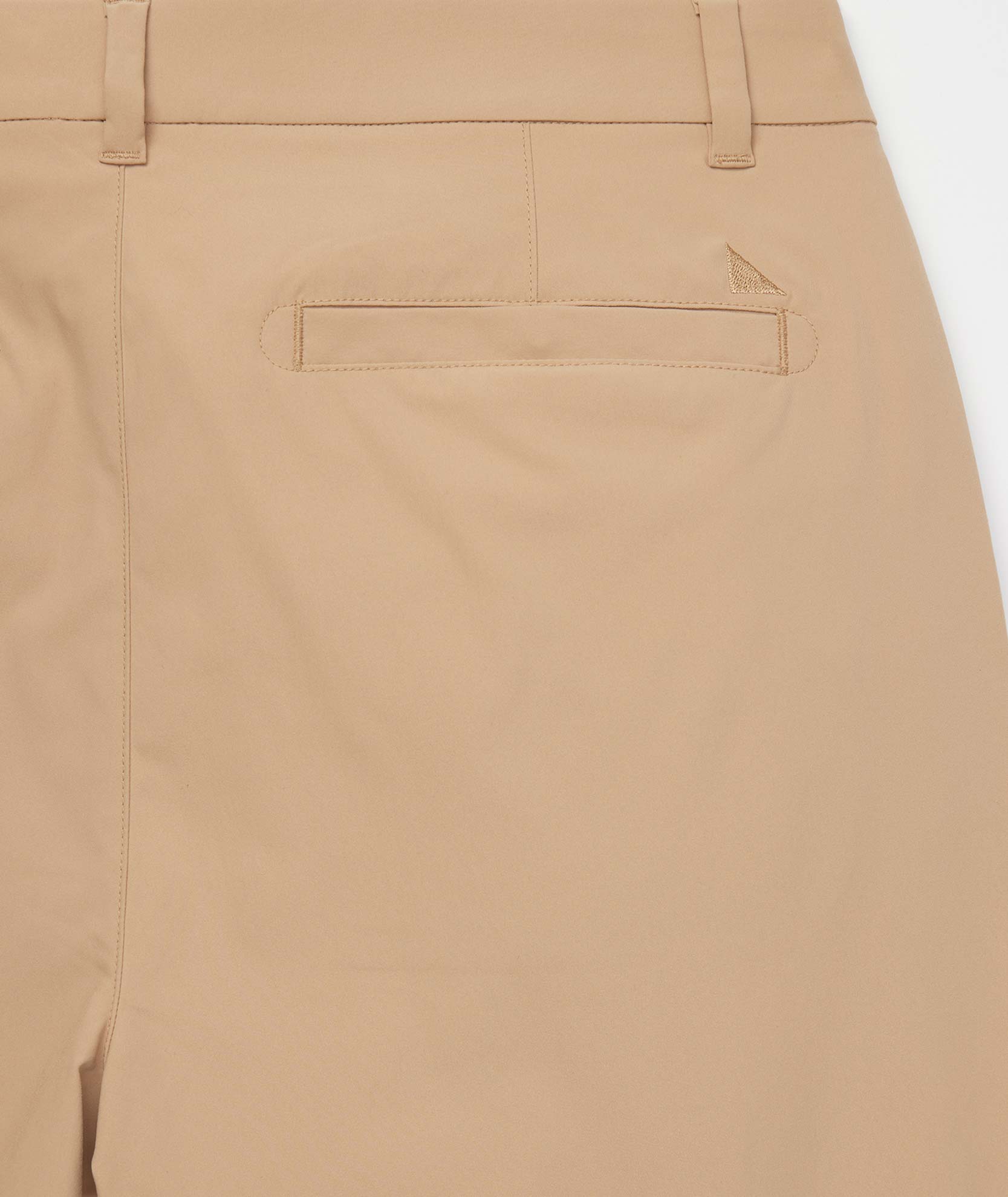 Model wearing Traveler Pant in tan - full body