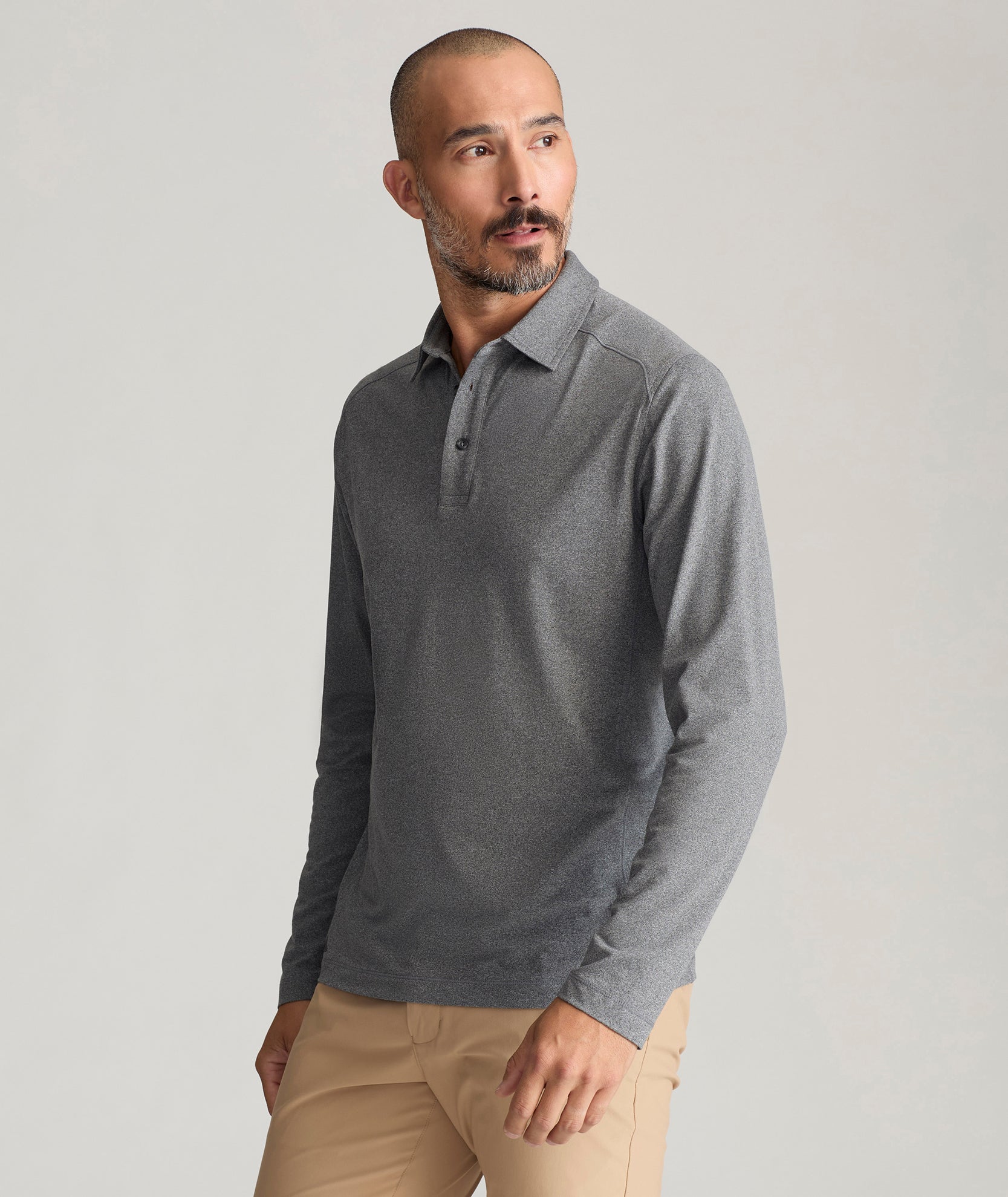 Model wearing an UNTUCKit Long-Sleeve Clavidor Polo.