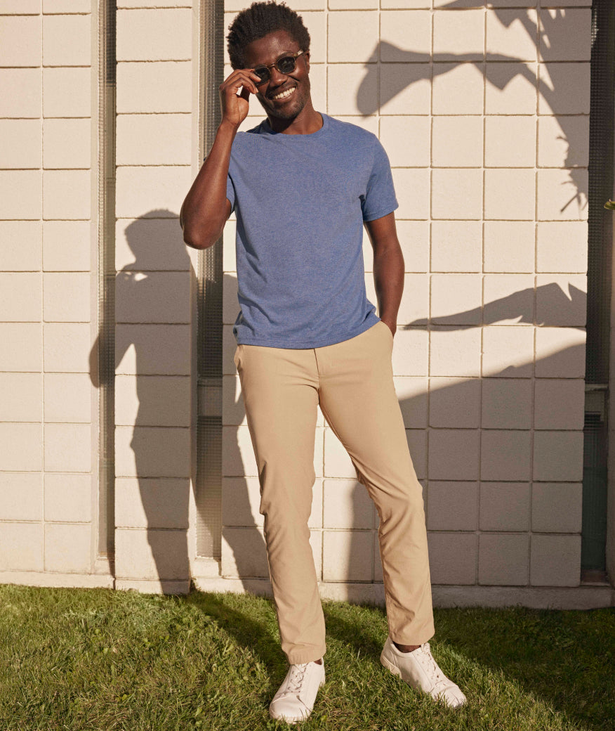 Model wearing Traveler Pant in tan - full body