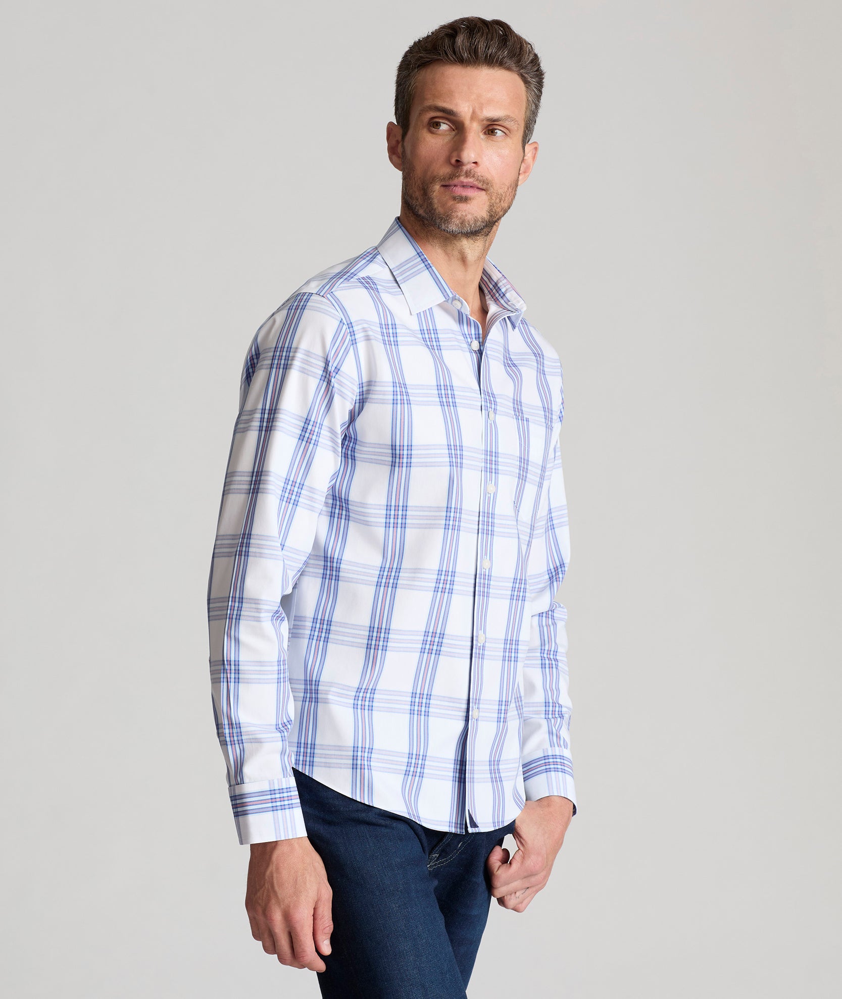 Model is wearing UNTUCKit Samson wrinkle free shirt. 