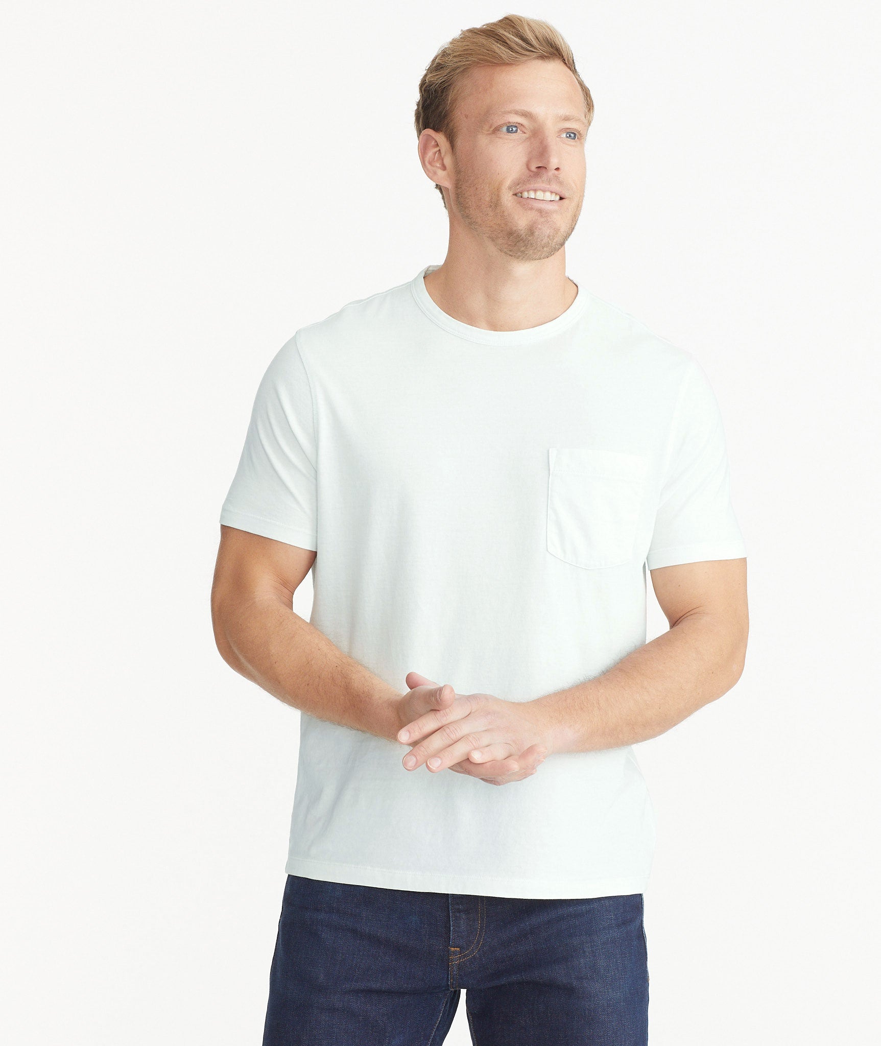 Model wearing an UNTUCKit Light Blue Mineral Dye Pocket Tee