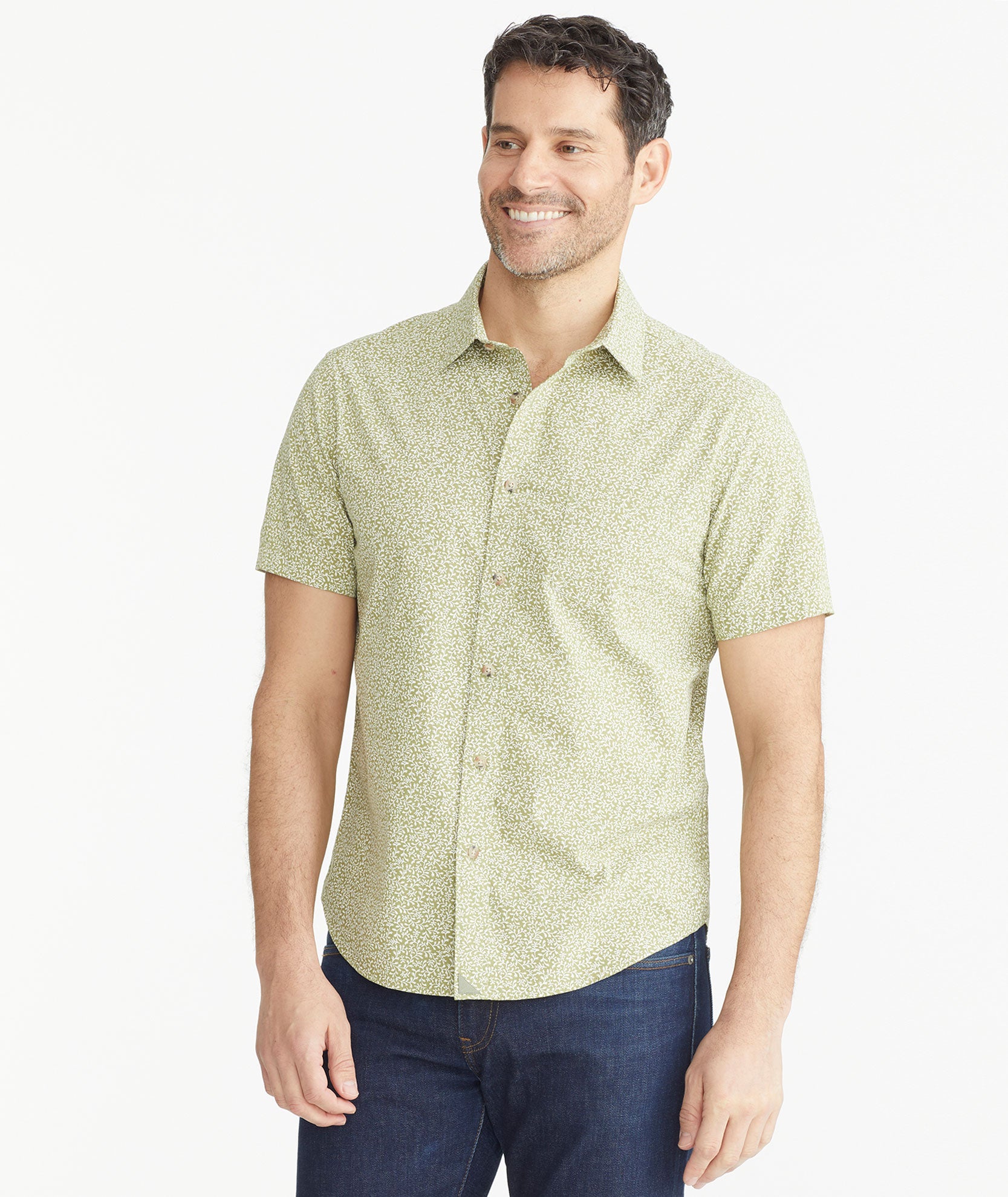 Model is wearing UNTUCKit Navy Cotton Short-Sleeve Buckley Shirt