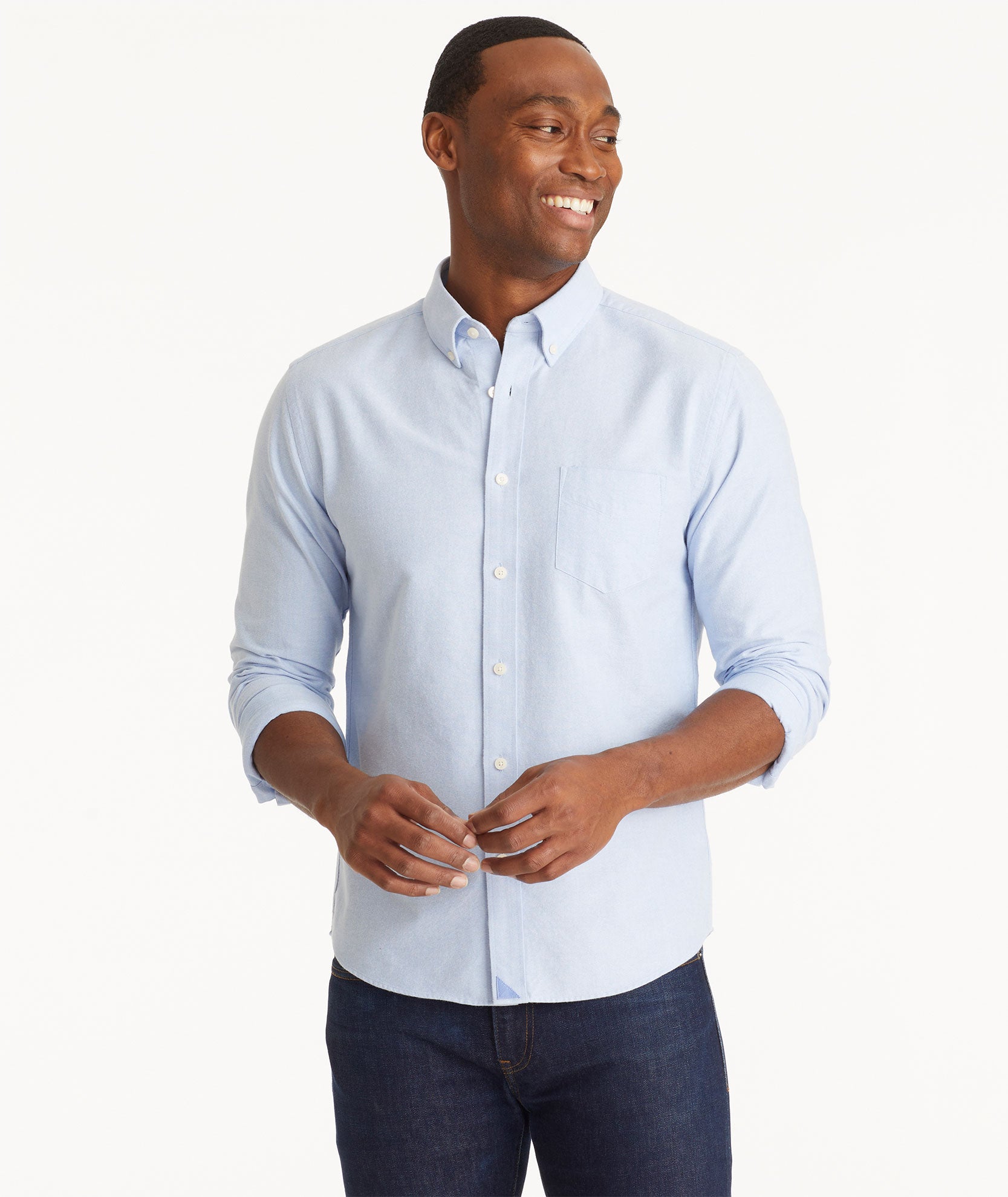 Model wearing an UNTUCKit Light Blue Oxford Picardan Shirt